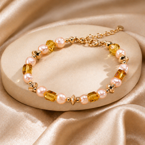 Amber glow champagne pearl bracelet with natural amber and vintage gold details by CLINDE JADE