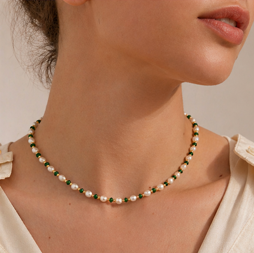 Model wearing emerald pearl beaded necklace with elegant everyday styling