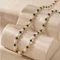 Emerald pearl beaded necklace with vintage gold details by CLINDE JADE