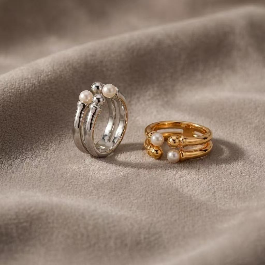 Adjustable pearl open ring in sterling silver and vintage gold finish by CLINDE JADE